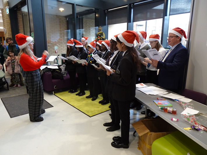 The Trumpington Community College choir, Clay Farm Centre Christmas Fair. Photo: Andrew Roberts, 9 December 2023.