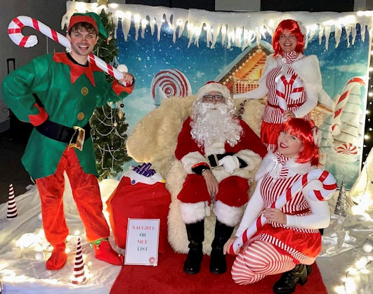 Trumpington Meadows Winter Wonderland: Santa and elves. Photo: TM DAG, 15 December 2023.